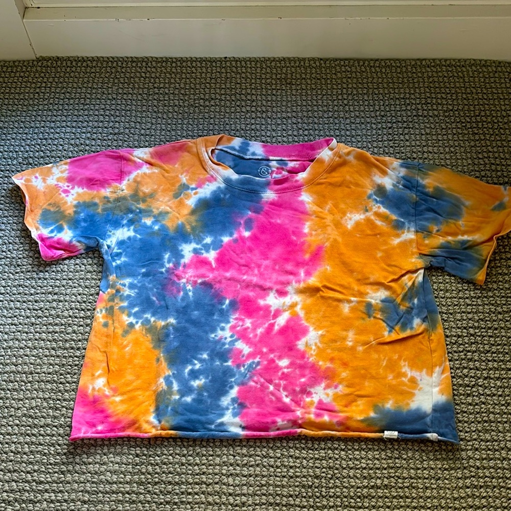I am selling a cute t-shirt with pink blue and yellow the dye!
